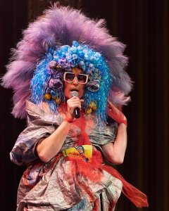 Photo of Machine Dazzle at his Penny Stamps Speaker Series event, by A.J. Saulsberry