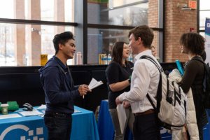 Student networking with a recruiter Student networking with a recruiter