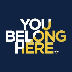 "You Belong Here" on a dark blue background