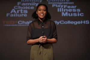 Kelsey Bengue gives a talk at a TEDx event organized by the Challenge Early College High School (2019).