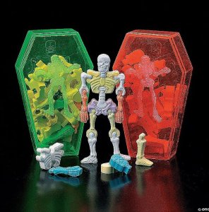 Interlocking skeleton bones hard candy & coffin photograph.