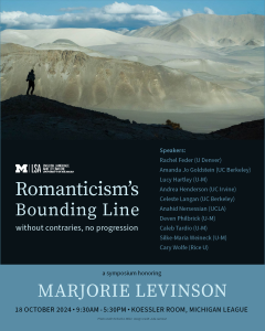 Distant silhouette of hiker overlooking mountainscape.