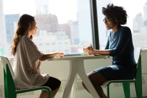Two people in an interview.