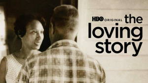 The Loving Story, showing a Black woman and a white man facing each other. The Loving Story, showing a Black woman and a white man facing each other.