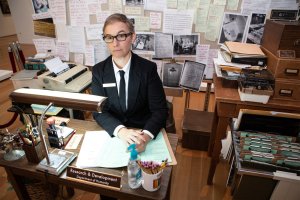 Stacey Kirby seated at a desk
