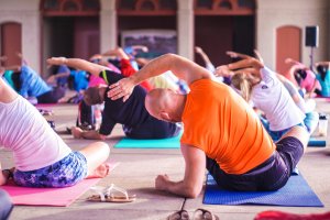 Group of people taking a yoga class