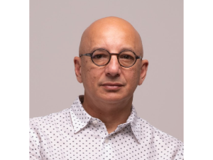 A portrait image of the speaker