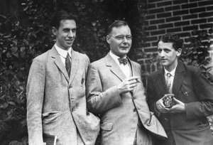 Three men in vintage black and white photograph: George Uhlenbeck (left) with Hendrik Kramers (middle) and Samuel Goudsmit, taken around 1928 in Ann Arbor, MI. Three men in vintage black and white photograph: George Uhlenbeck (left) with Hendrik Kramers (middle) and Samuel Goudsmit, taken around 1928 in Ann Arbor, MI.