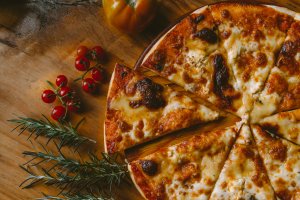 Pizza with vegetables on it Pizza with vegetables on it
