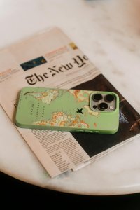 Image of a smart phone on a copy of the New York Times Image of a smart phone on a copy of the New York Times