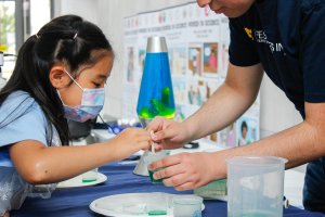 kids learning exploring the scientist spotlight at the Museum of Natural History