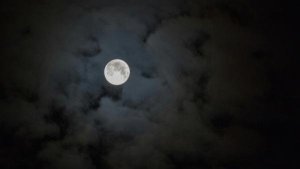 A full moon on a cloudy night A full moon on a cloudy night