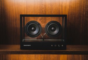 Clear boombox with wooden background