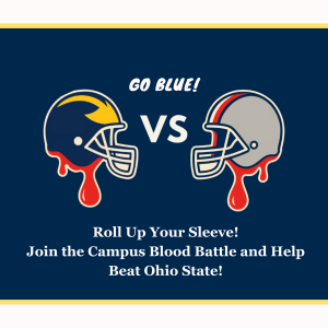 Graphic with two football helmets dripping blood, University of Michigan Helmet on the left, Ohio State University helmet on the right. Caption reads: "Roll Up Your Sleeve! Join the Campus Blood Battle and Help Beat Ohio State!" at the bottom and "GO BLUE!" at the top.