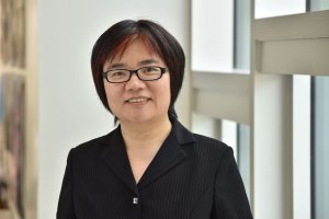 Lan Deng stands in the Liberty Annex at the University of Michigan