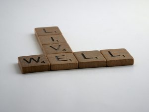 Scrabble pieces spelling  "Live Well."