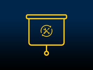 A screwdriver and wrench over a pull-down projector screen