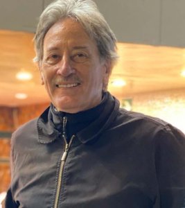 Dr. Tom D. Dillehay smiling at the camera