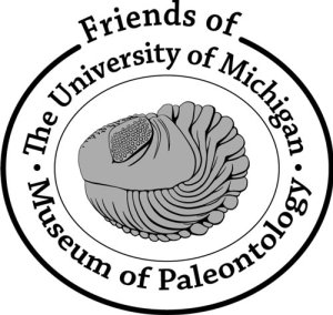 oval with fossilized bones surrounded by U-M Museum of Paleontology