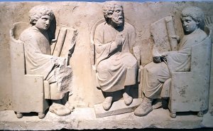 The image displays a 2nd-century Roman funerary relief sculpture found in Neumagen near Trier, Germany.