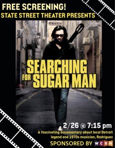 Poster for a free screening of "Searching for Sugar Man" at State Street Theater on 2/26 at 7:15 pm, featuring an image of a man walking and holding a guitar. Sponsored by WCBN.