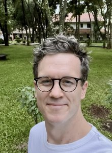 A headshot of speaker Colin Webster