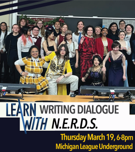 A group of students in various theatre costumes smile and pose in front of a blackboard