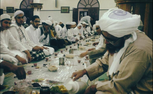 Individuals enjoying Yemeni coffee