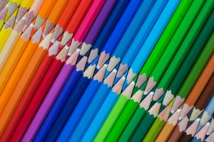 Colored pencils in a row