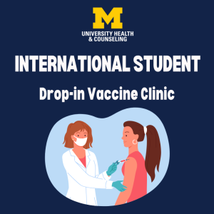 Doctor giving a shot to a student