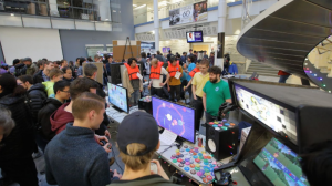 a large crowd plays student games