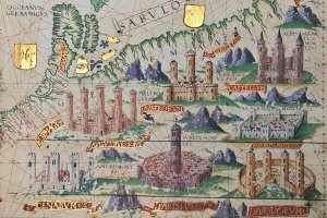 Cropped map facsimile showing European castles and decorated with gold leaf.