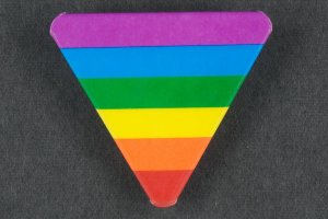 Sexual freedom rainbow triangle, from Pinback Buttons, Labadie collection.