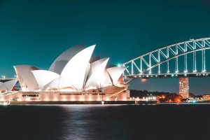 Night view of Sydney Opera House and Sydney Harbour Bridge.