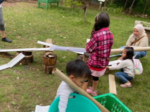 Children on a seesaw