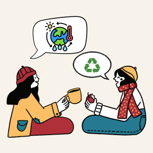Two people sit facing each other, talking about climate change and how to take action to combat it.