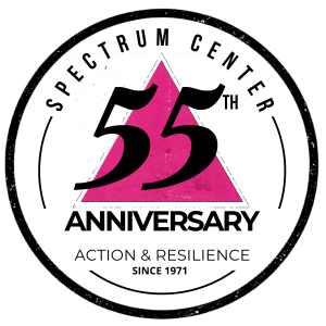 55th Anniversary Spectrum Center on a pink triangle