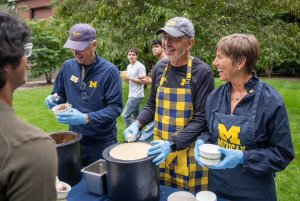 President Grasso Scooping Ice Cream