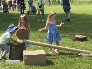 three children gravity playing