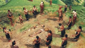 An image from a museum diorama shows native americans gathered for a burial ceremony