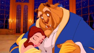 The Beast, surprised, holds Belle in this still from the Disney animated adaptation of Beauty and the Beast.