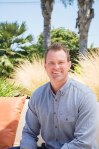 Outdoor headshot of Reed Harris II