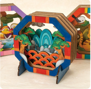 Small charye sang depicting tree, water, and rocks