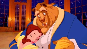 The Beast, surprised, holds Belle in this still from the Disney animated adaptation of Beauty and the Beast.