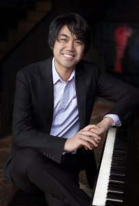 Sean Chen portrait with a piano.