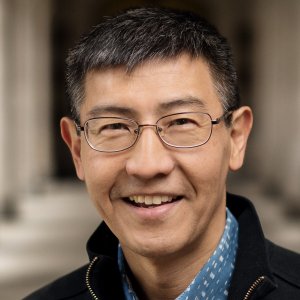 Kentaro Toyama smiles at the camera