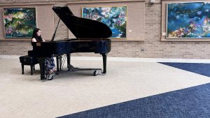 Student playing piano