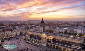 An aerial photo of the marketplace in Cracow at sunset.