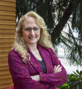 Jo Handelsman outside with pink blazer