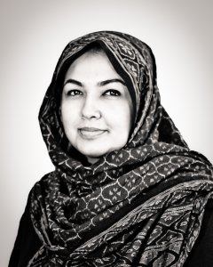 Black and white photo of Dr. Rizvi